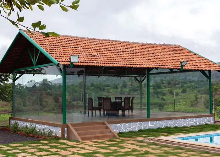 Stayvista's Ficus Farms: Mountain-View Retreat with Rustic Charm & Entertainment Igatpuri